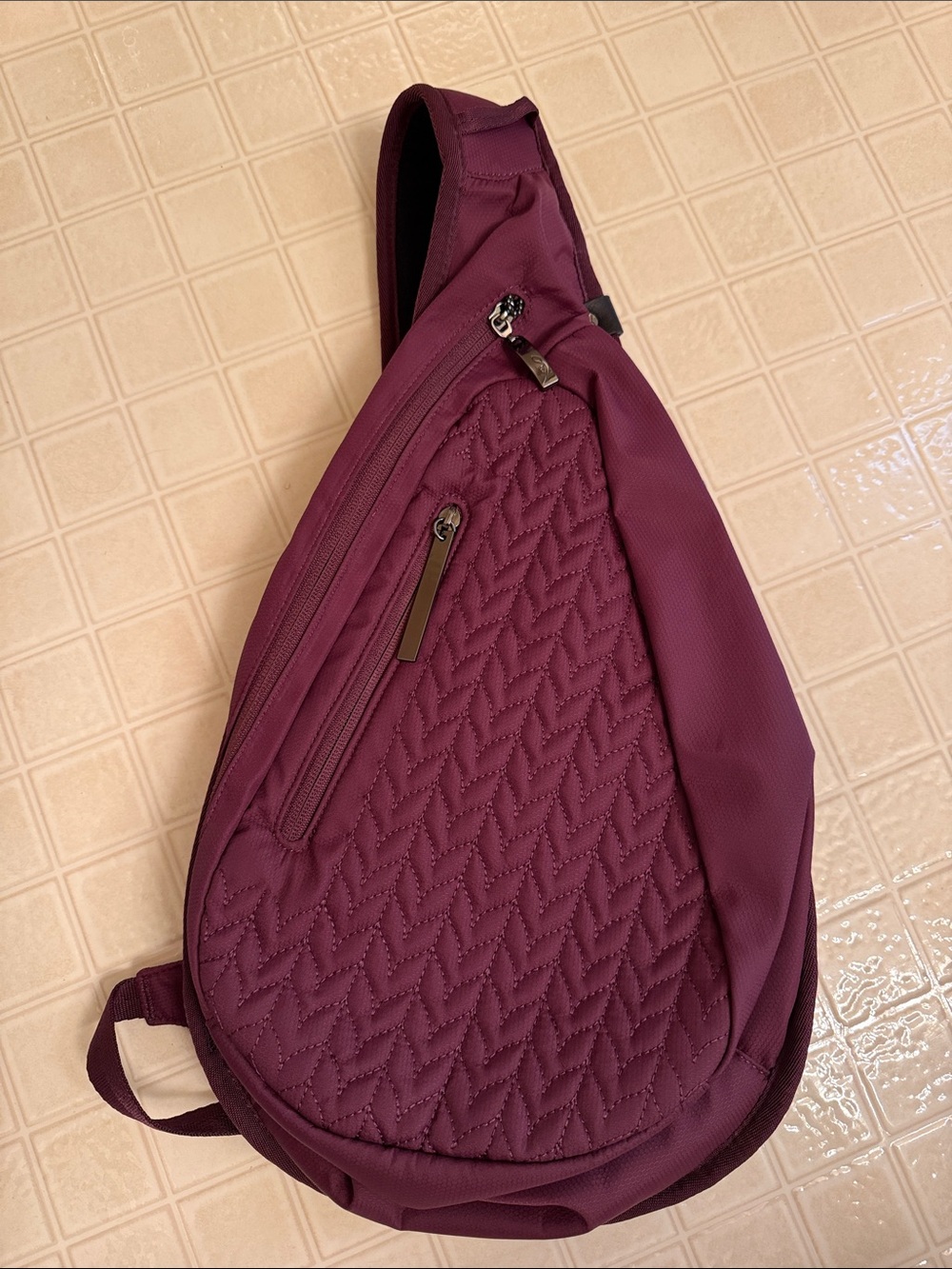 Sherpani Quilted Plum Sling Backpack